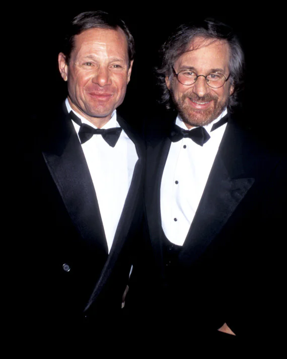 Michael Ovitz and Steven Spielberg in black tie, smiling side by side
