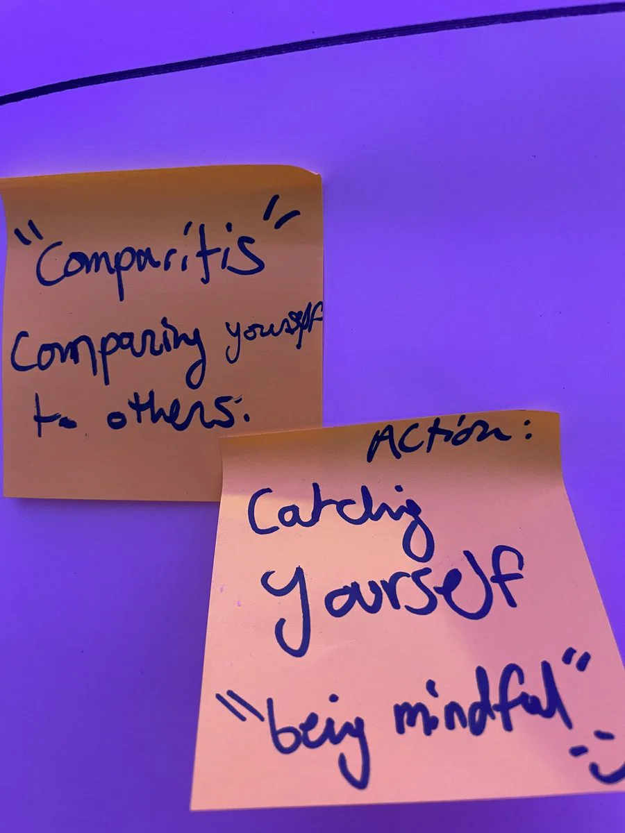 Two sticky notes: Comparitis, comparing yourself to others, and the action, catching yourself, being mindful